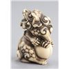 Image 2 : An ivory netsuke of a Shishi.