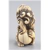 Image 3 : An ivory netsuke of a Shishi.
