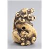 Image 4 : An ivory netsuke of a Shishi.