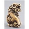 Image 5 : An ivory netsuke of a Shishi.