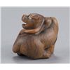 Image 5 : A wood netsuke of a tiger.