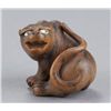 Image 6 : A wood netsuke of a tiger.