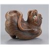 Image 8 : A wood netsuke of a tiger.