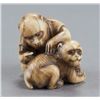 Image 1 : An ivory netsuke of two monkeys.