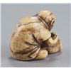 Image 3 : An ivory netsuke of two monkeys.