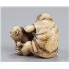 Image 4 : An ivory netsuke of two monkeys.