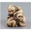 Image 6 : An ivory netsuke of two monkeys.