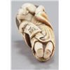 Image 3 : An ivory netsuke of a Tanuki.