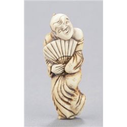 An ivory netsuke of a dancer.