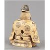 Image 3 : An ivory netsuke of a seated Court figure.
