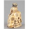 Image 4 : An ivory netsuke of a seated Court figure.
