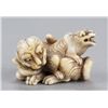 Image 2 : An ivory netsuke of two tigers.