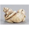 Image 5 : An ivory netsuke of two tigers.