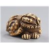 Image 2 : An ivory netsuke of a Shishi.