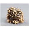 Image 3 : An ivory netsuke of a Shishi.