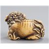 Image 4 : An ivory netsuke of a Shishi.