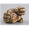 Image 6 : An ivory netsuke of a Shishi.