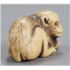 Image 2 : An ivory netsuke of a monkey.