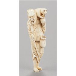 An ivory netsuke of a Sumarawashi with monkey.