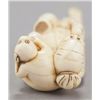 Image 6 : An ivory netsuke of a Sumarawashi with monkey.