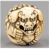 Image 1 : An ivory netsuke of a Shishi.