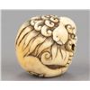 Image 3 : An ivory netsuke of a Shishi.