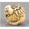 Image 5 : An ivory netsuke of a Shishi.