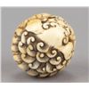 Image 7 : An ivory netsuke of a Shishi.