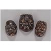 Image 1 : A group of three wood netsuke of masks.