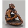Image 10 : A group of two carved wood netsuke.