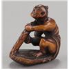 Image 8 : A group of two carved wood netsuke.