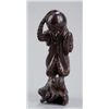 Image 1 : A tall wood netsuke of an octopus and monkey.