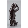 Image 4 : A tall wood netsuke of an octopus and monkey.