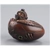 Image 1 : A wood netsuke of Tengo no Tamago.