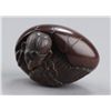 Image 9 : A wood netsuke of Tengo no Tamago.