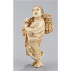 An ivory netsuke of an oyster girl.