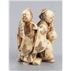 Image 1 : An ivory netsuke of two dancers.