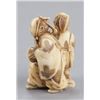 Image 5 : An ivory netsuke of two dancers.