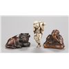 Image 1 : A group of three netsuke of various materials.