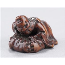 A wood netsuke of Shoki.