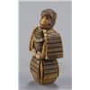 Image 2 : An ivory netsuke of a monkey in a suit of armor.