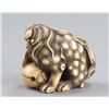 Image 4 : An ivory netsuke of a Shishi and a mokugyo.