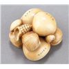 Image 2 : An ivory netsuke of a shell cluster.