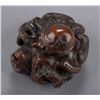 Image 6 : A wood netsuke of an octopus and a monkey.