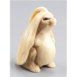 An ivory netsuke of a Tanuki.