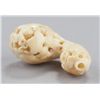 Image 9 : A group of two carved ivory netsuke.