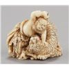 Image 1 : An ivory netsuke of Busho slaying the tiger.