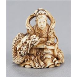 An ivory netsuke of Benten with dragon