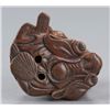 Image 7 : A wood netsuke of Daikoku.