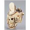 Image 6 : A group of three ivory netsuke.